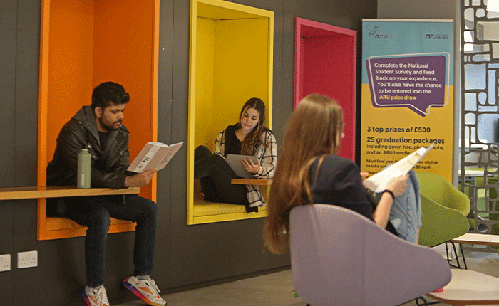 A seating area near Blend coffee shop with students relaxing.