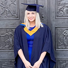 Abbie Lake in graduation cap and gown