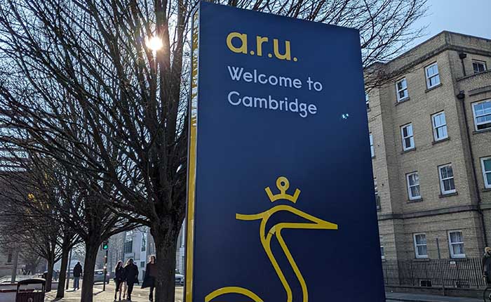 Signage outside the entrance to ARU Cambridge