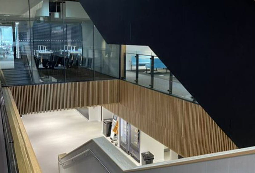 A hallway and staircase at ARU Peterborough