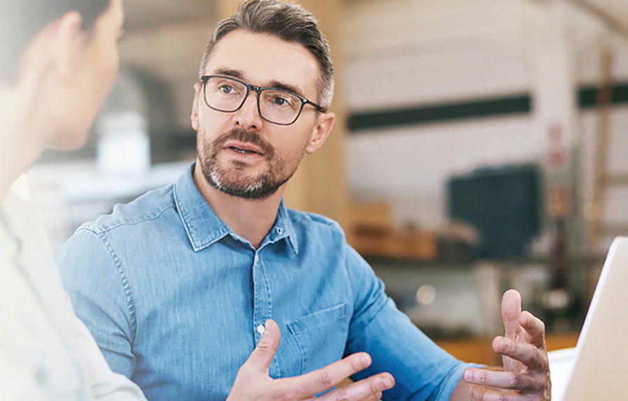 Man discussing with laptop