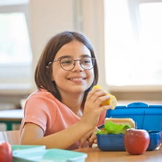 A child eating breakfast