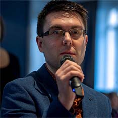 Chris speaking at a conference