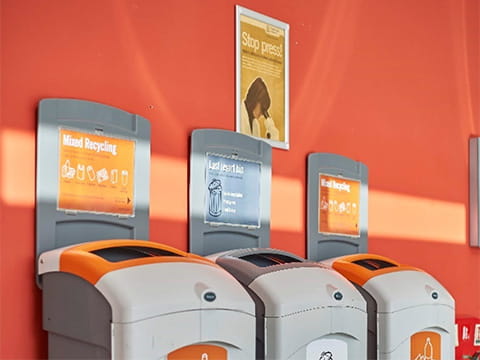 Line of three recycling bins on one of ARU's campuses