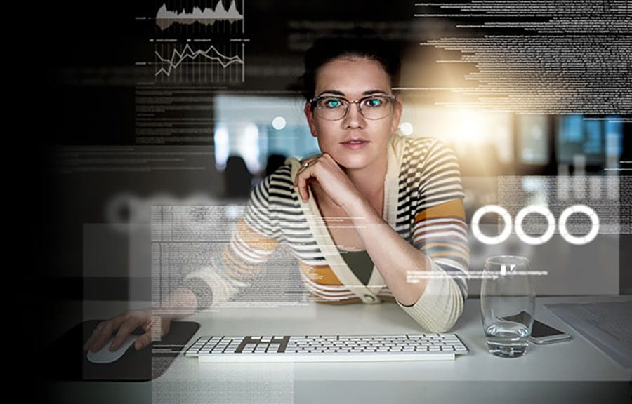 Woman looking at data on a screen