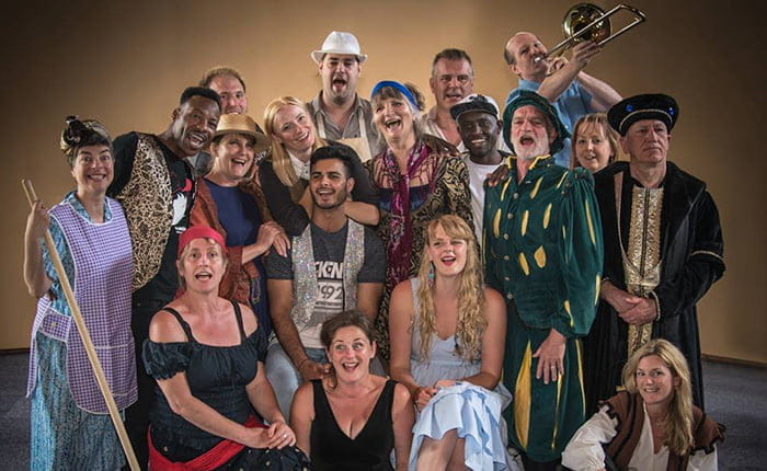 The cast of Come Yew In!, a community performance initiated by Jeannette Baxter