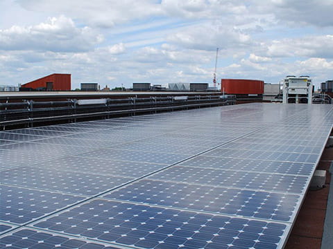 Solar panels covering a flat roof