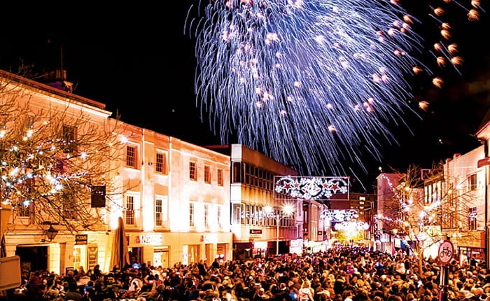 Crowd of people watching fireworks over the High Street in Chelmsford