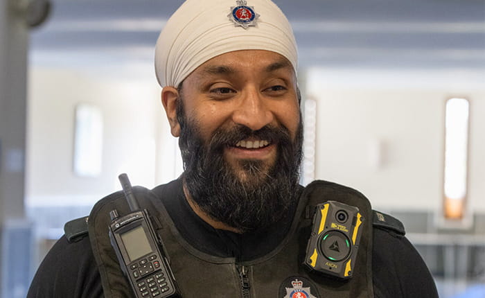 Male Police officer smiling