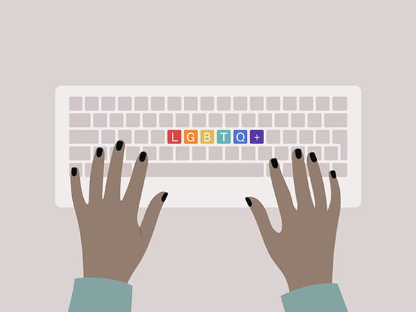 Hands typing on a keyboard, top view, rainbow buttons with an LGBTQ+ sign, queer community support