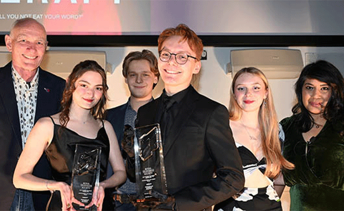 ARU students Martha Wallam, Kai Wissler and Chloe Kelly receiving a Royal Television Society East Award