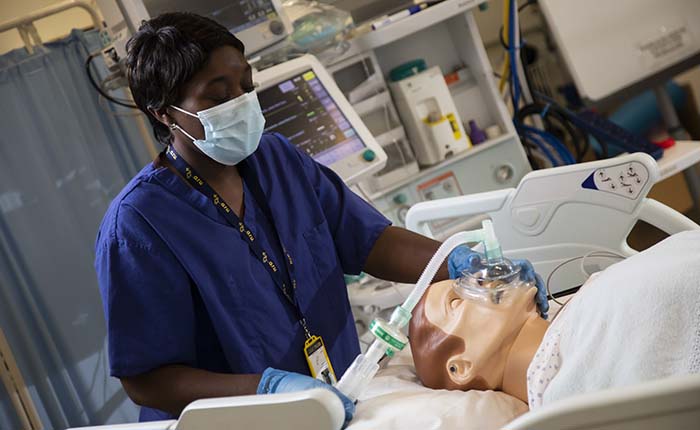 An ODP student intubating a dummy in the skills lab