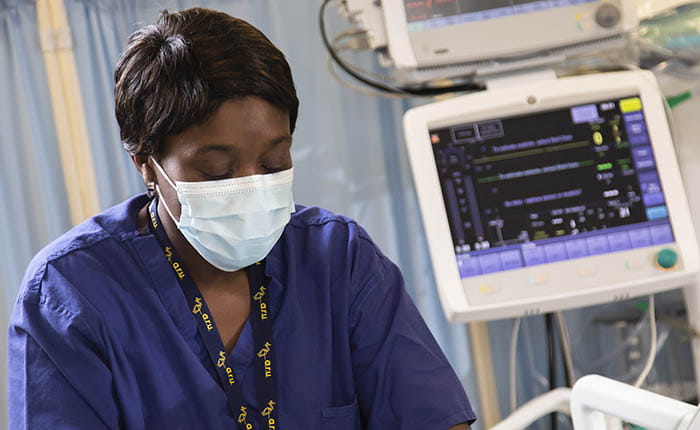 A student practising in the Operating Department Practice lab