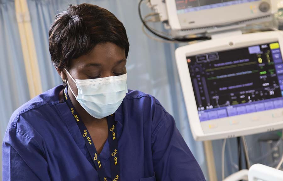 A student practising in the Operating Department Practice lab