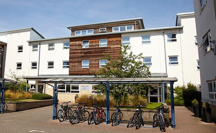 Exterior shot of Sedley Court and its bike park, Cambridge