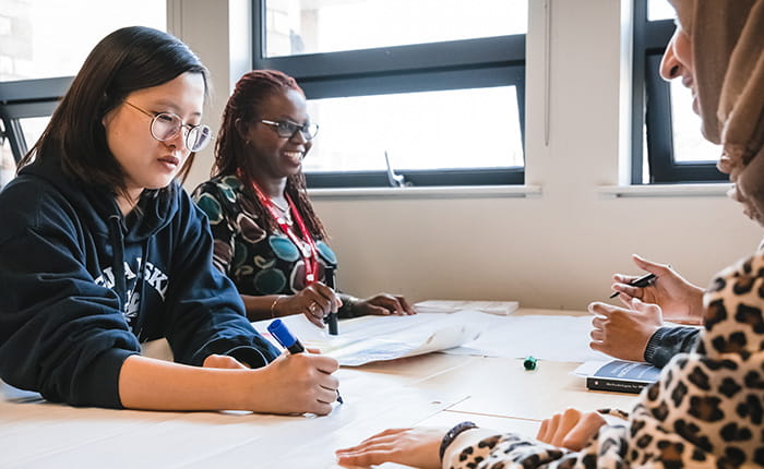 Small group of Social Work students studying together