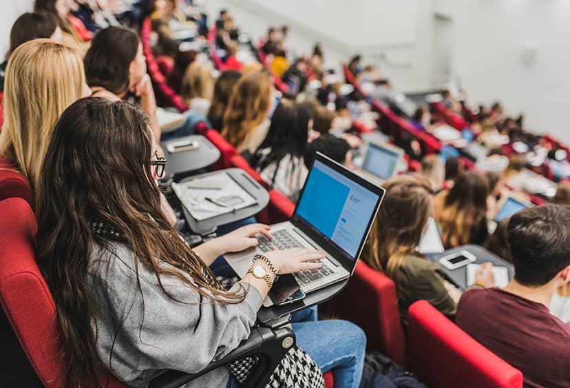 Rows of students in a lecture theatre