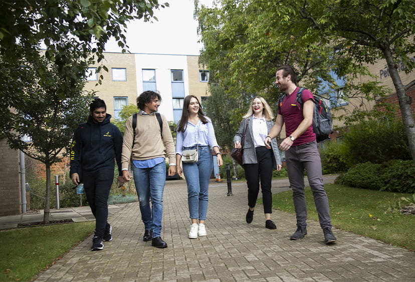 A group of students walking on-campus