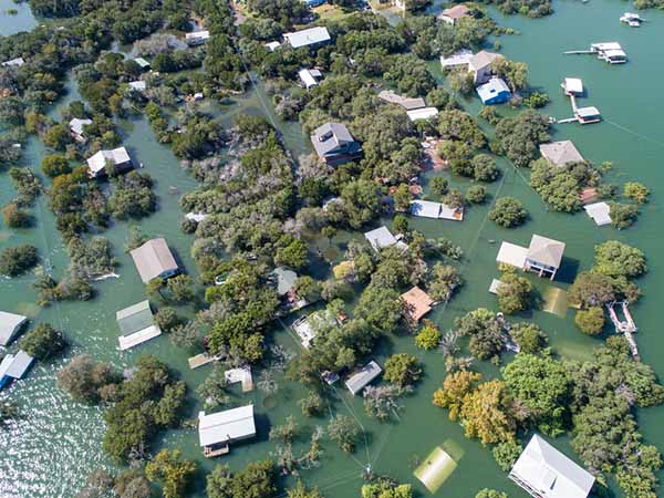 Aerial view of flooded houses and trees