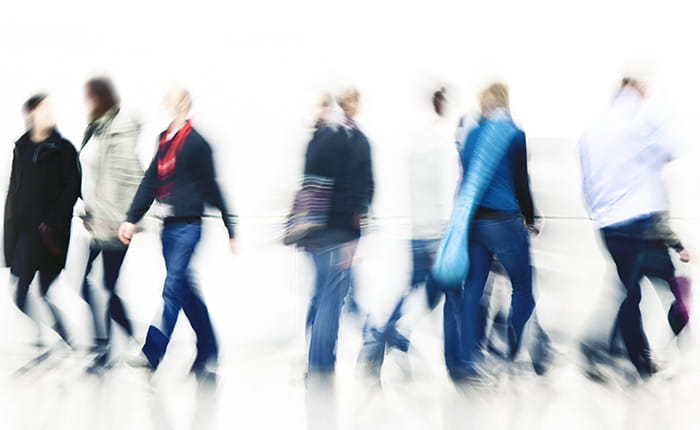 Blurred photo of people walking