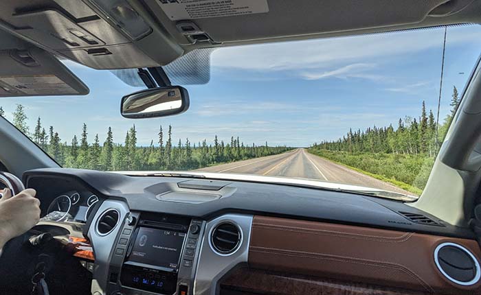 Highway in Inuvik, Northwest Territories, photographed through a car windscreen