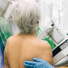 Woman having a mammography scan
