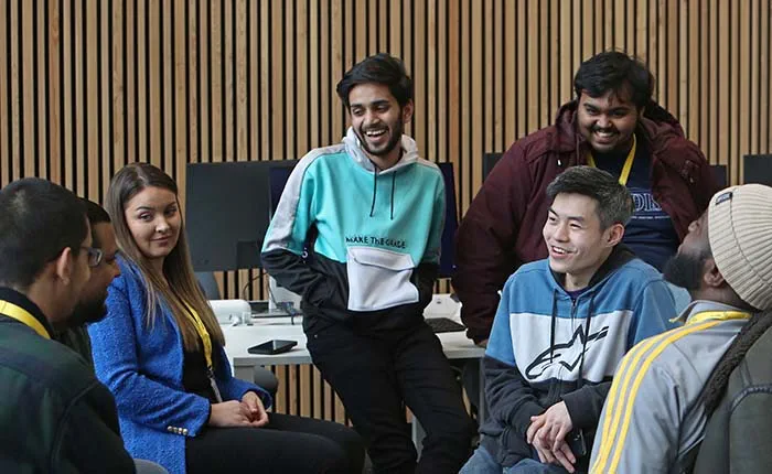 Group of university students chatting