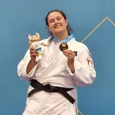 Lucy Williams receives her medal