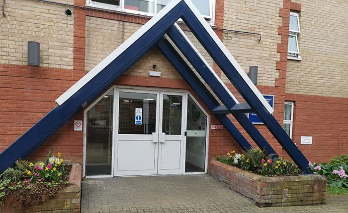 The archway at the entrance to Swinhoe House, Cambridge